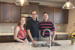 Werner Homes President Bob Werner, center, flanked by his son, Jake Werner, and daughter-in-law, Mandy Werner.
